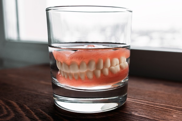 Tips For Comfort And Secure Attachment For New Dentures